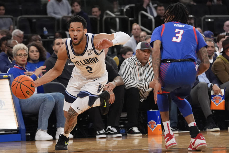 Villanova guard Mark Armstrong (2) drives against DePaul guard Jalen Terry (3) during the first half of an NCAA college basketball game in the first round of the Big East Conference men's tournament Wednesday, March 13, 2024, in New York. (AP Photo/Mary Altaffer)