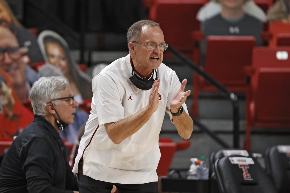 Oklahoma coach Lon Kruger yells to his players during the first half of an NCAA college basketball game against Texas Tech, Monday, Feb. 1, 2021, in Lubbock, Texas. (AP Photo/Brad Tollefson)