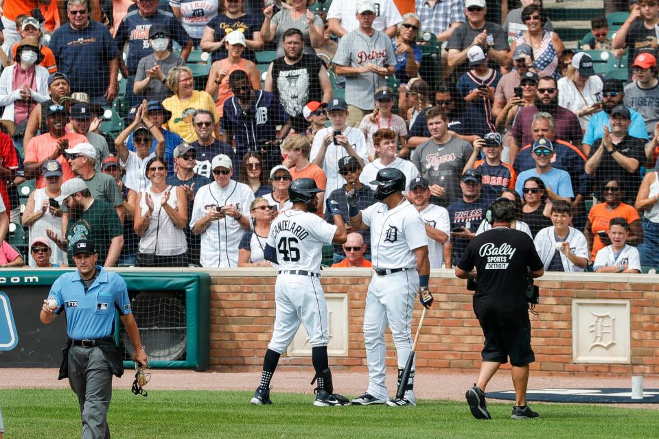 Detroit Tigers third baseman Jeimer Candelario (46) celebrates his home run with designed hitter Miguel Cabrera (24) during the fourth inning against Los Angeles Angels at Comerica Park in Detroit, Thursday, August 19, 2021.