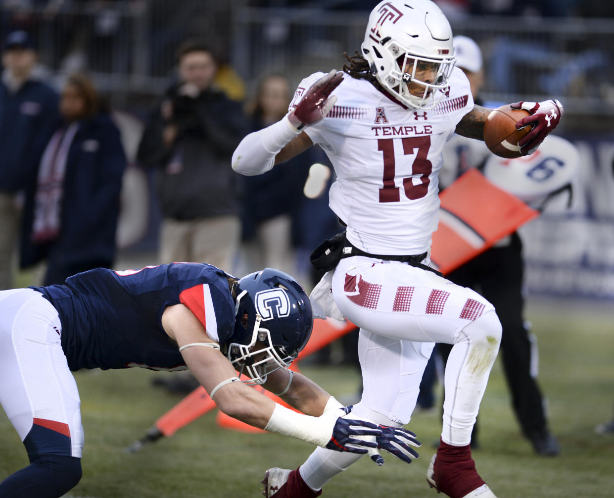 Temple wide receiver Isaiah Wright (13) scores the first of many TDs his team had in a 57-7 win over UConn. (AP Photo/Stephen Dunn)