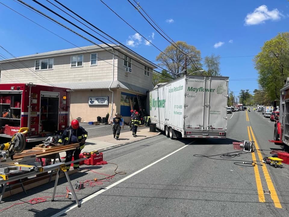 A three-vehicle crash shut down Pompton Avenue/Route 23 in Cedar Grove on Friday, April 26, 2024 and sent a tractor-trailer into a store.