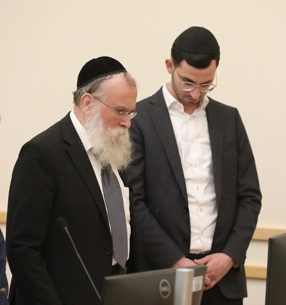 Rabbi Nathaniel Sommer, left, and son Aaron Sommer in Rockland County Court on Wednesday, Sept. 20, 2023.