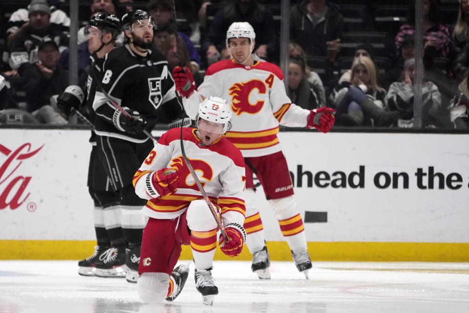 Calgary Flames right wing Tyler Toffoli (73) celebrates after scoring against the Los Angeles Kings during the second period of an NHL hockey game Monday, March 20, 2023, in Los Angeles. (AP Photo/Marcio Jose Sanchez)