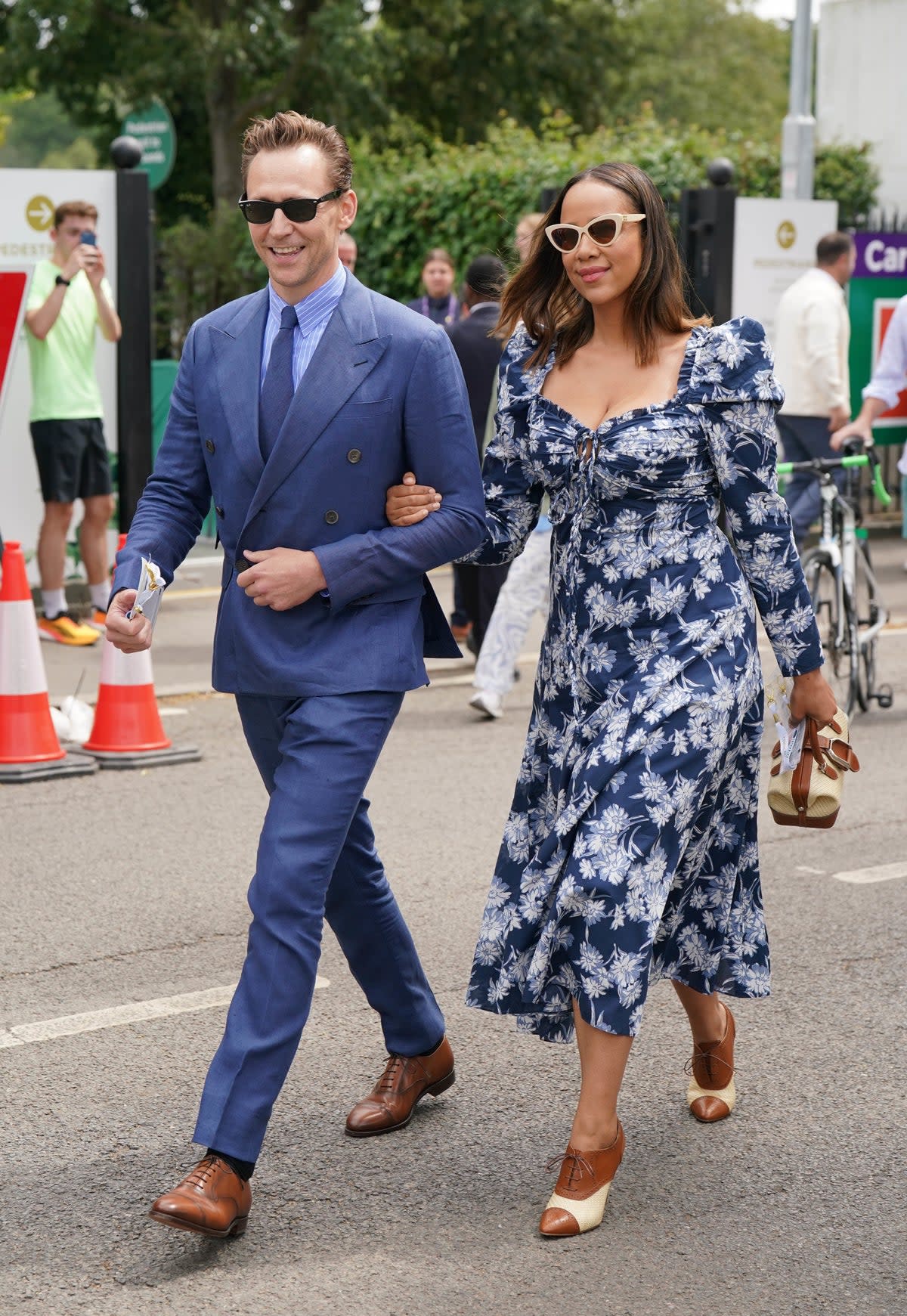 Tom Hiddleston and Zawe Ashton arriving at Wimbledon day 14 (PA)