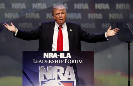 Republican presidential candidate Donald Trump addresses members of the National Rifle Association during their NRA-ILA Leadership Forum during at their annual meeting in Louisville, Kentucky, May 20, 2016. REUTERS/John Sommers II