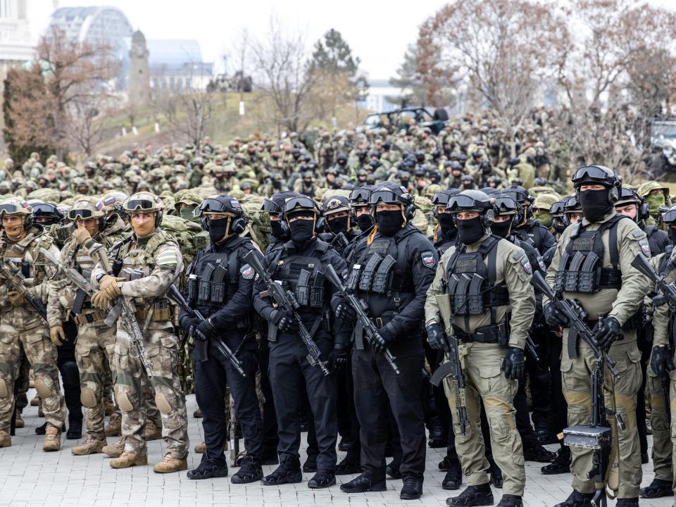 Russian servicemen take part in a review of the Chechen Republic's troops and military hardware at the residence of Ramzan Kadyrov, head of the Chechen Republic.