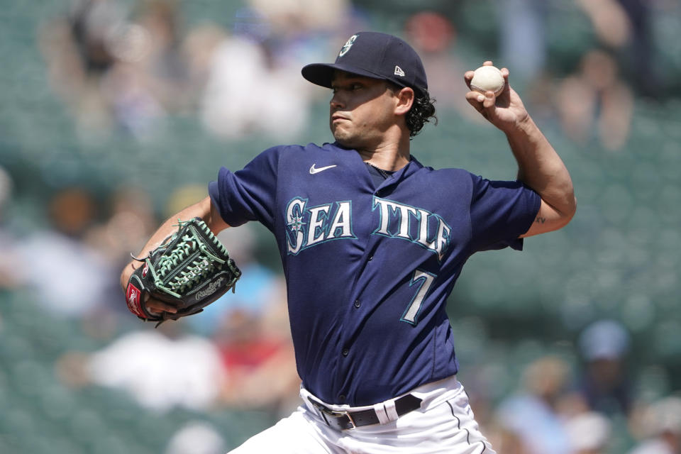 Seattle Mariners starting pitcher Marco Gonzales throws during the first inning of a baseball game against the Texas Rangers, Wednesday, July 27, 2022, in Seattle. (AP Photo/Ted S. Warren)