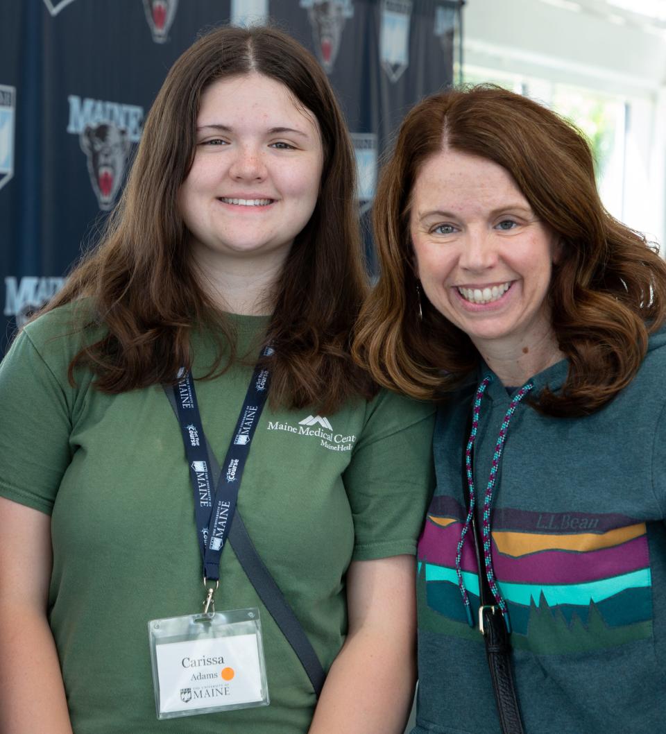 Incoming student Carissa Adams of Connecticut with her mother, Cinnamon Adams, at freshman orientation at the University of Maine. They were drawn in part by the low price the university offers to lure students from neighboring states.