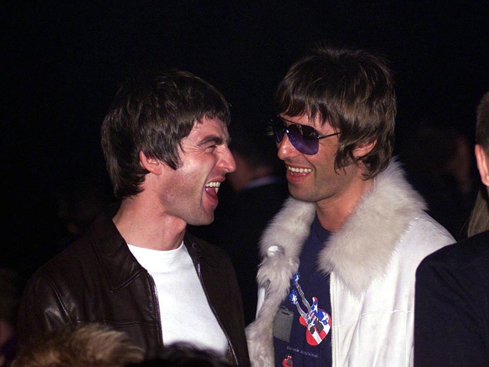 Singer-songwriter Noel Gallagher (left) and his brother Liam (right), from the pop group Oasis, at the NME Carling Awards at The Planit Arches, Shoreditch, in east London. 18/8/01: Fans of Oasis have a chance to see the anniversary show as tickets go on sale.  * exactly 10 years after their first ever gig. The band are playing six UK dates later this year - their first of 2001 in Britain - for which they have turned their back on the usual stadiums to perform to just a handful of fans. The tickets were due to go on sale at 10am but fans have been queuing for hours in Glasgow, Manchester and London to make sure they are among the chosen few.    A spokeswoman for the band said This is a rare chance to see the band in such small venues. There are only around 4,000 tickets available for each of the cities. Oasis are playing three cities which are close to their hearts and which proved important in their early days.. 6/10/01: Rock superstars Oasis will unveil new material as they begin a series of intimate shows to celebrate ten years as a band. The Gallagher brothers have turned their backs on large stadiums to embrace six shows in smaller venues, the likes of which they have not played for years. The dates are the first in the UK this year and sold out within minutes of going on sale this summer.