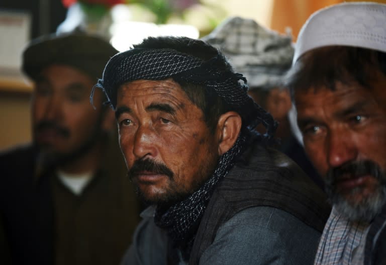 Afghan villagers meet at a madrassa in Hajigak, in Bamiyan province