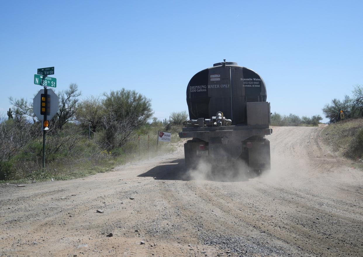 A Dynamite Water hauler turns onto North 138th Street in the Rio Verde Foothills after leaving EPCOR's New River/Desert Hills hauling station. The truck delivered water to a residence in the Rio Verde Foothills on April 11, 2023.