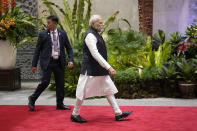 Indian Prime Minister Narendra Modi leaves after attending the East Asia Summit at the Association of Southeast Asian Nations (ASEAN) Summit in Jakarta, Indonesia, Thursday, Sept. 7, 2023. (AP Photo/Achmad Ibrahim, Pool)