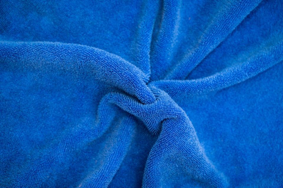 Full frame shot of wrinkles Microfiber cloth texture and background. (how to clean a mirror without windex)