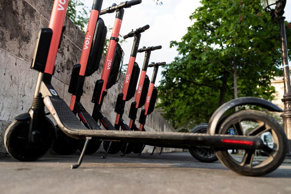 Electric scooters of provider Voi are pictured on April 1, 2019 in central Paris. - The market for personal mobility devices (EDP for 'engins de deplacement personnel' in French), like electric scooters, electric unicycles and hoverboards, rose by 32 per cent in value in 2018, and was driven by a strong growth of 76 per cent of the electric scooter market, according to a study published April 1, 2019. (Photo by KENZO TRIBOUILLARD / AFP)        (Photo credit should read KENZO TRIBOUILLARD/AFP via Getty Images)