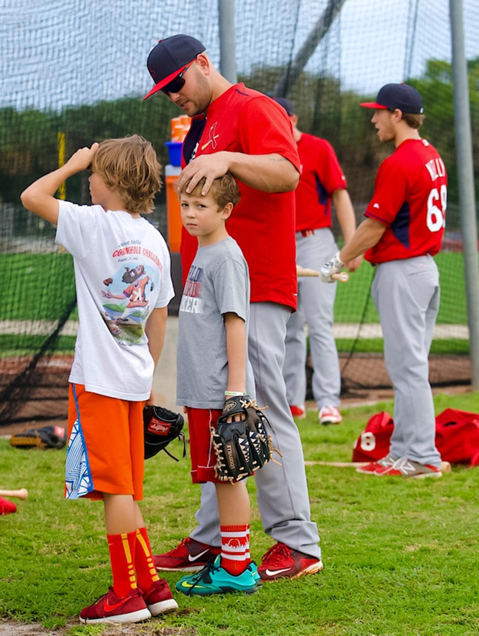 Matt Holliday, right, is pictured with sons Jackson, left, and Ethan at spring training with the St. Louis Cardinals.