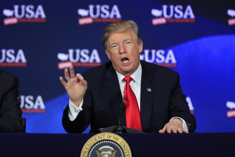 In this May 5, 2018 photo, President Donald Trump speaks during a roundtable discussion on tax reform at Cleveland Public Auditorium and Conference Center in Cleveland, Ohio. Trump says he will announce his decision on whether to keep the U.S. in the Iran nuclear deal on Tuesday. (AP Photo/Manuel Balce Ceneta)