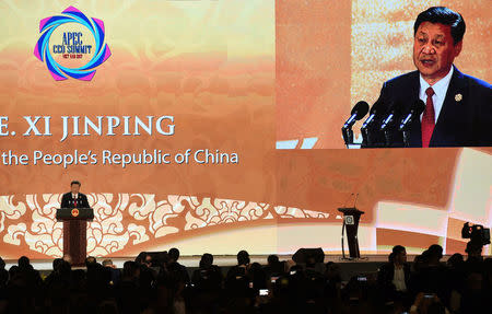 China's President Xi Jinping speaks on the final day of the APEC CEO Summit, part of the broader Asia-Pacific Economic Cooperation (APEC) leaders' summit, in Danang, Vietnam, November 10, 2017. REUTERS/ Anthony Wallace/Pool