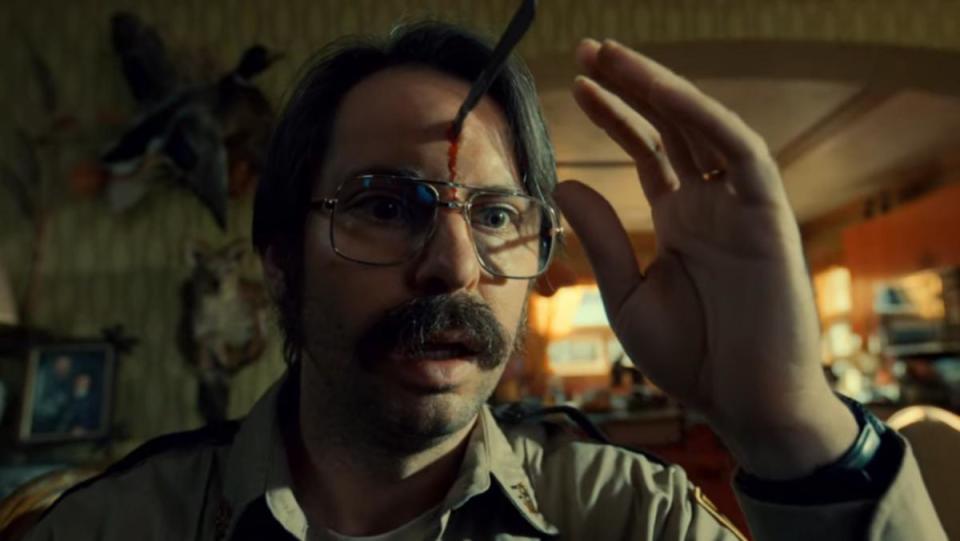 An image from The Outside shows Martin Starr with a scalple stuck in his head