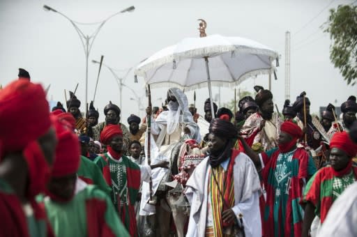 The Emir of Kano (C), Muhammadu Sanusi II is at the centre of tensions between new and old styles of governance