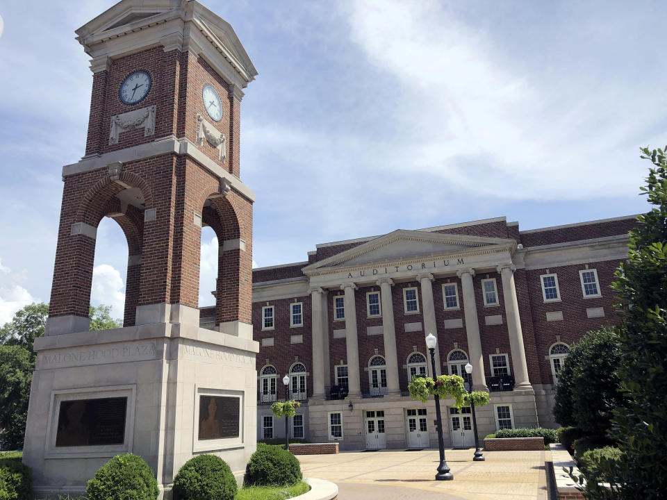 FILE - The Autherine Lucy Clock Tower at the Malone Hood Plaza stands in front of Foster Auditorium on the University of Alabama campus in Tuscaloosa, Ala., June 16, 2019. Home-district projects for members of Congress are back, sprinkled across the government-wide $1.5 trillion bill President Joe Biden signed recently. Retiring Sen. Richard Shelby attained $126 million, in the government-wide $1.5 trillion bill President Joe Biden signed recently, for two campuses of the University of Alabama, his alma mater, including for an endowment for its flagship Tuscaloosa campus to hire science and engineering faculty. (AP Photo/Bill Sikes, File)