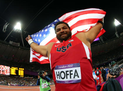 Reese Hoffa of the United States celebrates his bronze medal in the Men's Shot Put Final on Day 7. (Photo by Alexander Hassenstein/Getty Images)