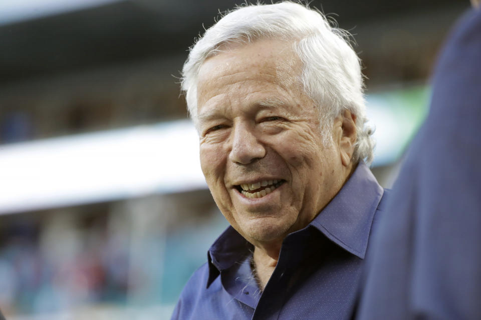 FILE - In this Feb. 2, 2020, file photo, New England Patriots owner Robert Kraft walks on the field before the NFL Super Bowl 54 football game between the San Francisco 49ers and Kansas City Chiefs, in Miami Gardens, Fla. A Florida appeals court ruled Wednesday, Aug. 19, 2020, that police violated the rights of New England Patriots owner Robert Kraft and others when they secretly video recorded them paying for massage parlor sex acts, barring the tapes' use at trial and dealing a potentially deadly blow to their prosecution. (AP Photo/Wilfredo Lee, File)