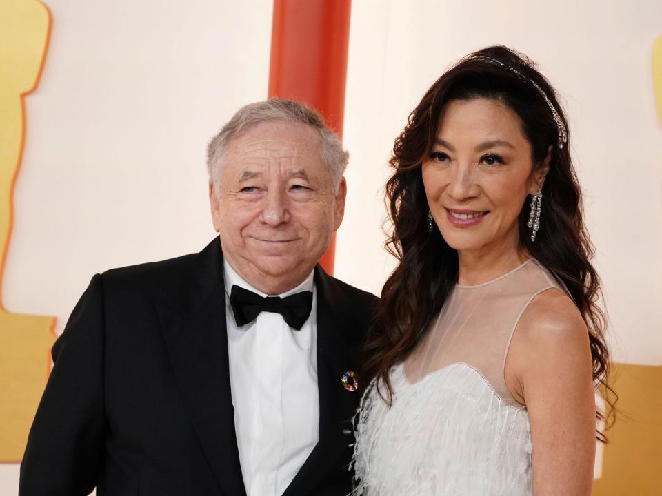 Jean Todt and Michelle Yeoh arrive at the Oscars.