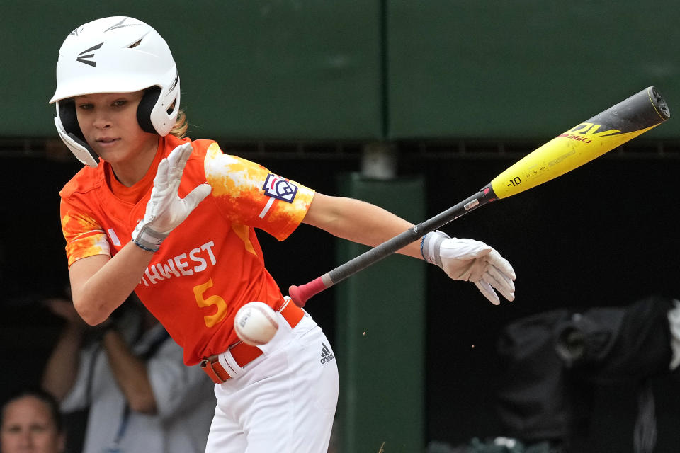 Needville, Texas' Jagger McRae lays down a bunt for a single against Seattle during the ninth inning of a baseball game at the Little League World Series in South Williamsport, Pa., Wednesday, Aug. 23, 2023. Texas won 1-0. (AP Photo/Gene J. Puskar)