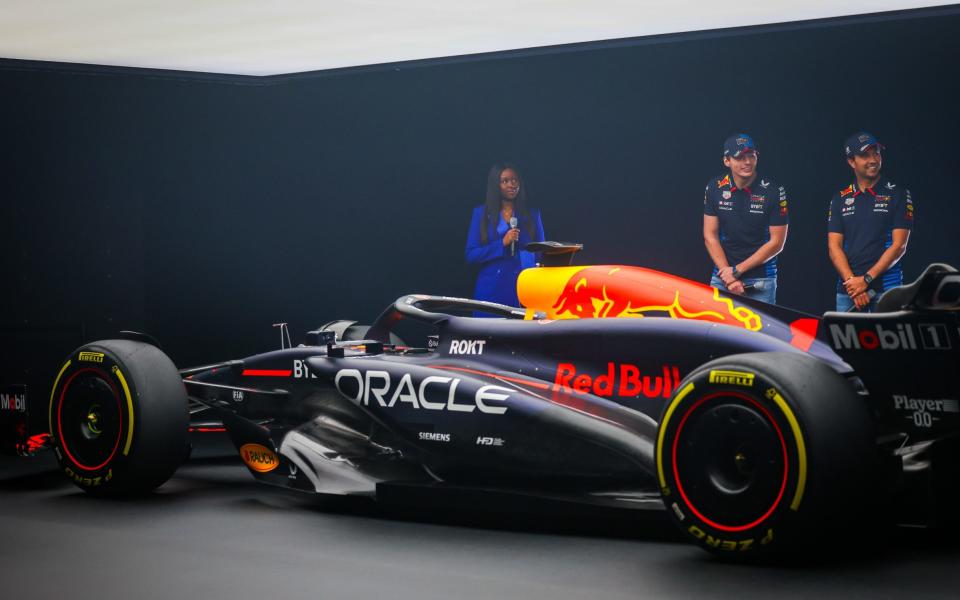 Max Verstappen and Sergio Perez with the new Red Bull car