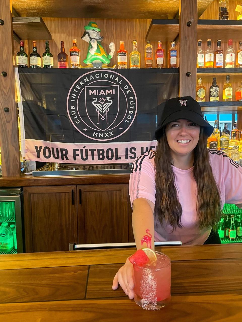 Bartender Morgan Zeiss serves a Messi Margarita at the Irish Brigade pub in Lake Worth Beach.