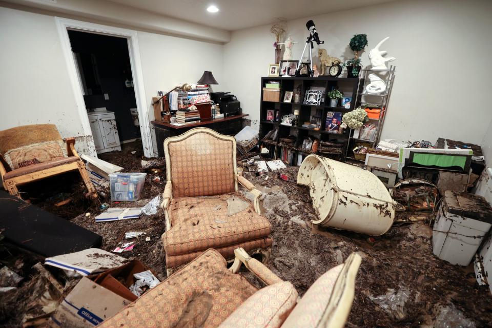 A home on Chamonix Court is full of mud and debris after flooding and mudslides in Draper on Friday, Aug. 4, 2023. Draper Mayor Troy Walker declared a state of emergency due to flooding. | Kristin Murphy, Deseret News