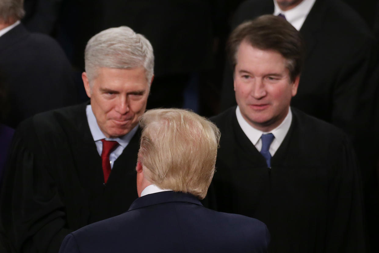 Donald Trump, Neil Gorsuch and Brett Kavanaugh.