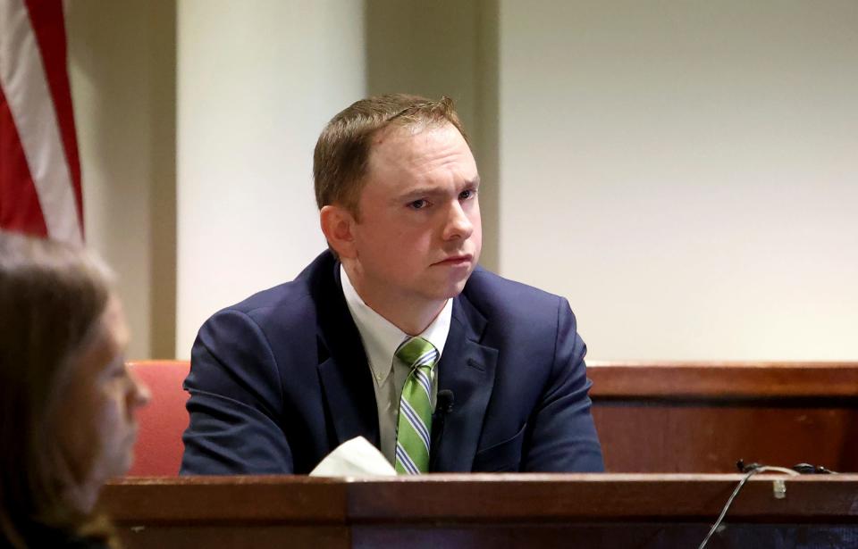 Defendant Aaron Dean takes the stand to testify on Monday, Dec. 12, 2022, during his trial for the murder of Atatiana Jefferson in Fort Worth, Texas. Dean, a former Fort Worth police officer, is accused of fatally shooting Jefferson in 2019, during an open structure call.