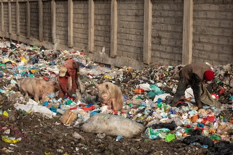 People rummaging through the slum's rubbish dumps often find the bodies of babies - Credit: Simon Townsley/The Telegraph