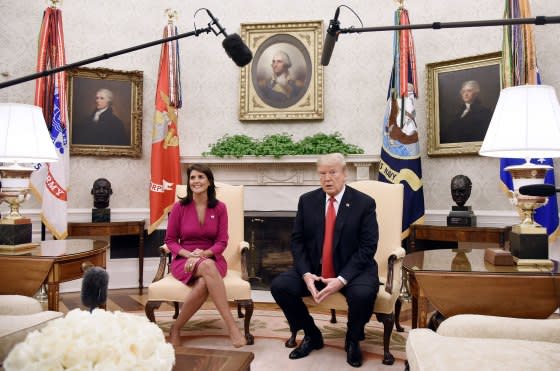 Then-President Donald Trump meets with Haley, then United States Ambassador to the United Nations in the Oval office of the White House on Oct. 9, 2018 where she announced her resignation.<span class="copyright">Olivier Douliery—AFP/Getty Images</span>