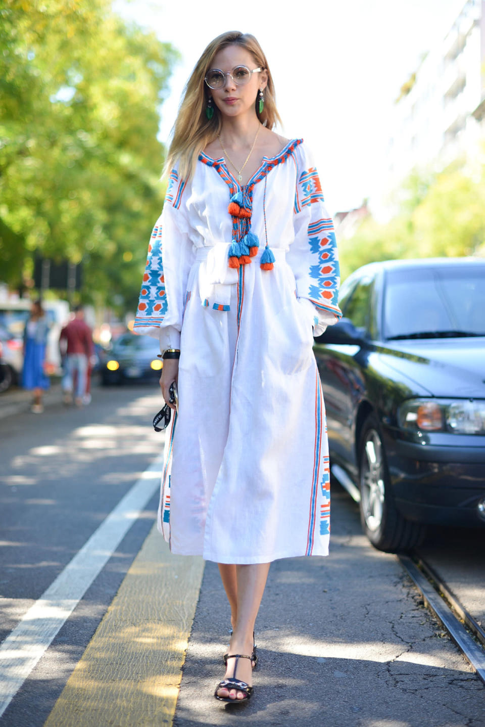 A street style star in a Vita Kin dress at Milan Fashion Week 2015. 