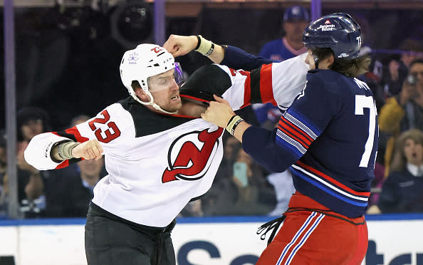 NEW YORK, NEW YORK – APRIL 03: Kurtis MacDermid #23 of the New Jersey Devils fights with Matt Rempe #73 of the New York Rangers during the first period at Madison Square Garden on April 03, 2024 in New York City. (Photo by Bruce Bennett/Getty Images)