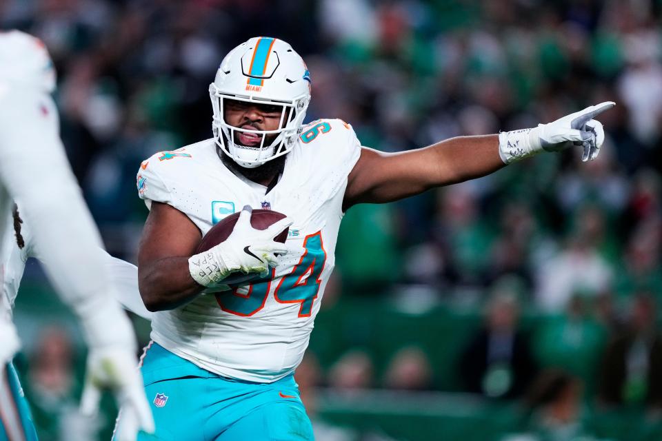 Miami Dolphins defensive tackle Christian Wilkins (94) celebrates a fumble recovery during the first half of an NFL football game against the Philadelphia Eagles on Sunday, Oct. 22, 2023, in Philadelphia. (AP Photo/Matt Rourke)