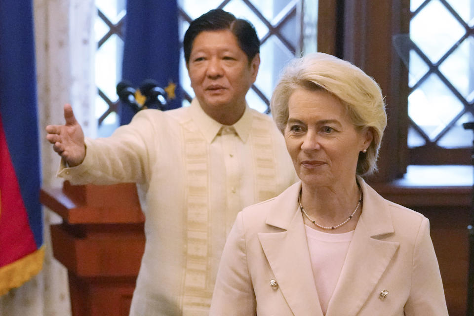 Philippine President Ferdinand Marcos Jr., left, gestures beside European Commission President Ursula von der Leyen during her visit at the Malacanang Presidential Palace in Manila, Philippines on, Monday, July 31, 2023. (AP Photo/Aaron Favila, Pool)