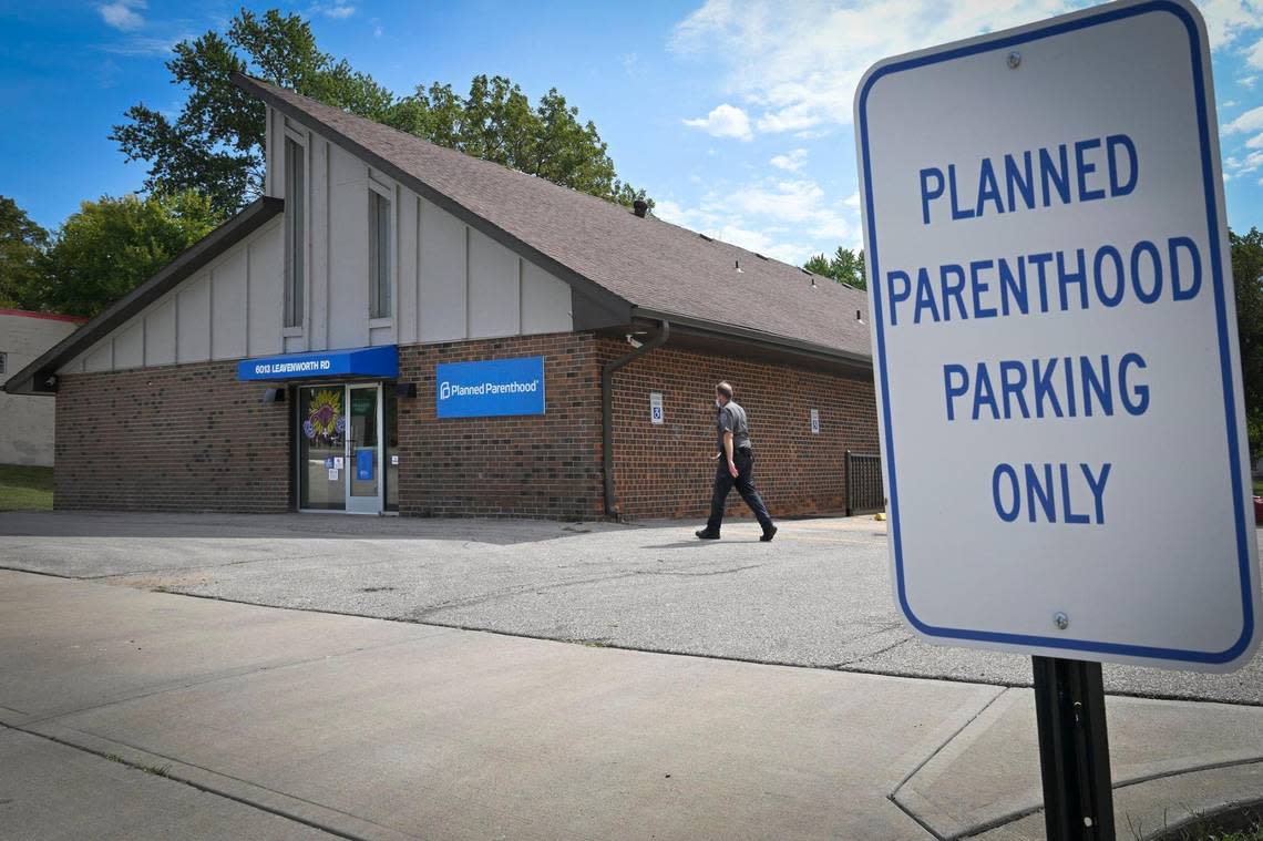 A security guard patrols the parking lot at the new Planned Parenthood health center at 6013 Leavenworth Road in Kansas City, Kansas.