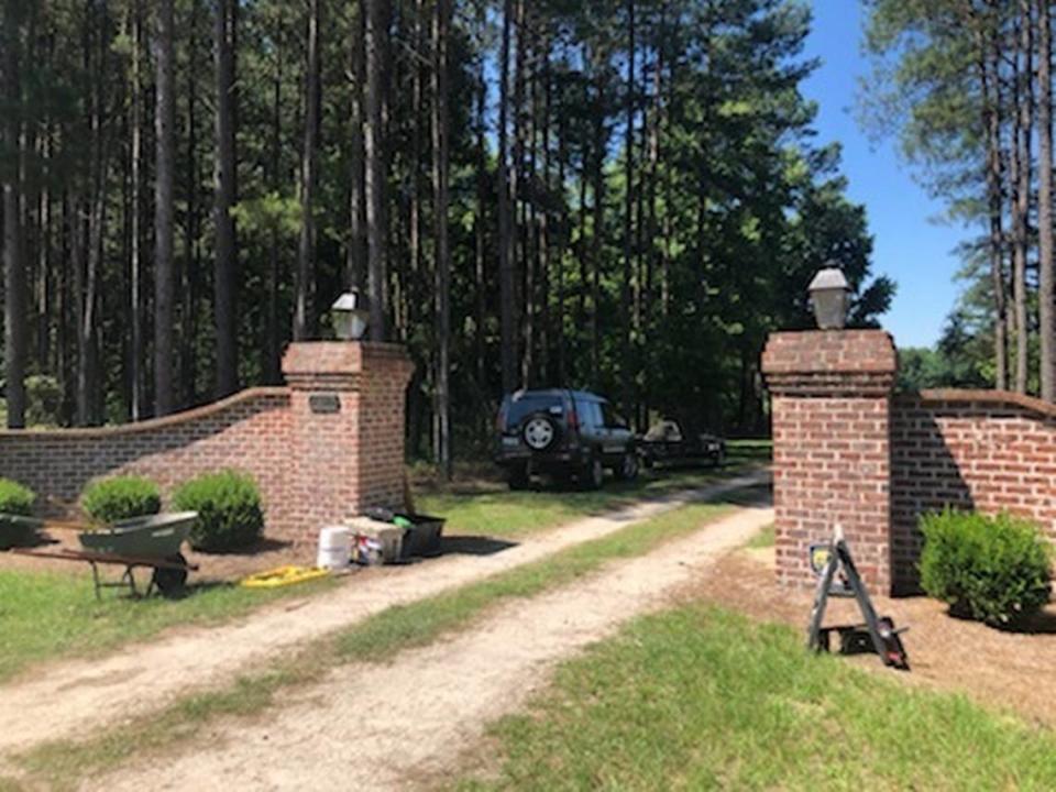 A worker was installing a metal gate at the entrance of the Murdaugh family home in Islandton, SC. He said it was for privacy because people had been trying to get on the property.