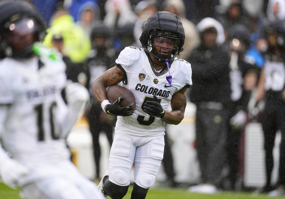 Colorado wide receiver Jimmy Horn Jr. runs after catching a pass during the first half of the team's spring NCAA college football game, Saturday, April 27, 2024, in Boulder, Colo. (AP Photo/David Zalubowski)