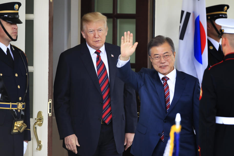 FILE - In this May 22, 2018, file photo, South Korean President Moon Jae-in waves as he is welcomed by U.S. President Donald Trump to the White House in Washington. South Korea said on Friday, March 29, 2019, Moon will travel to the United States on April 10-11 to meet with Trump for a summit on North Korean nuclear diplomacy. (AP Photo/Manuel Balce Ceneta, File)