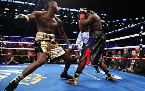 Deontay Wilder punches Bermane Stiverne during their rematch for Wilder's WBC heavyweight title at the Barclays Center on November 4, 2017 in the Brooklyn Borough of New York City - Credit:  Getty Images