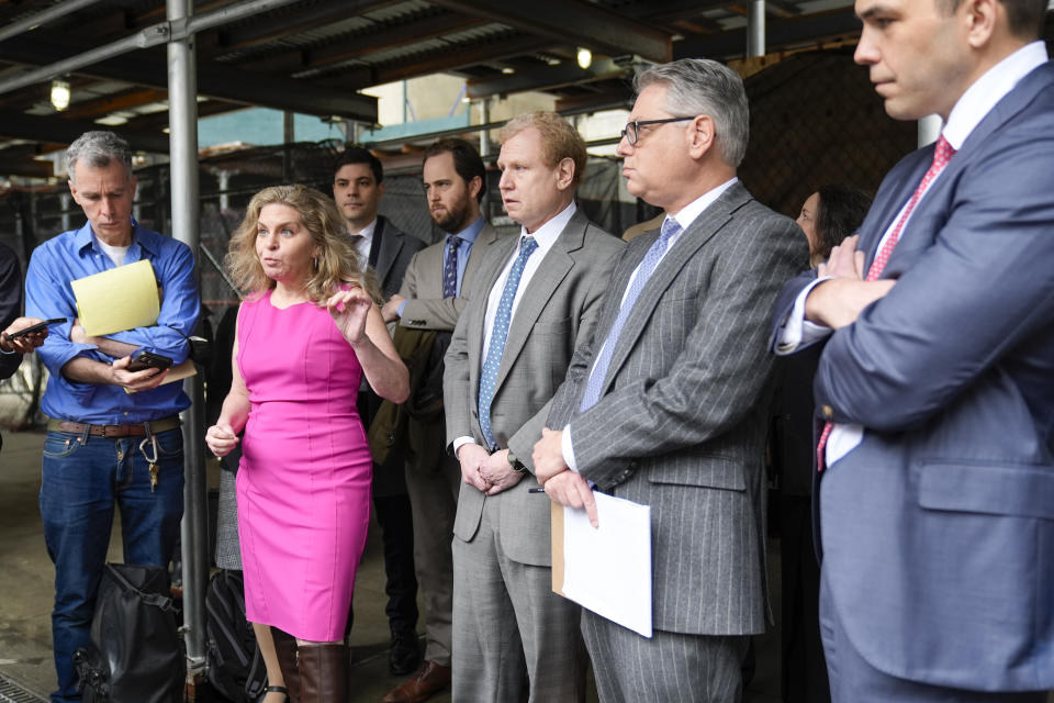 Attorney Stacey Richman, second from left, who represented former Rock & Roll Hall of Fame curator Craig Inciardi is joined by other defense attorneys as she speaks to reporters, Wednesday, March 6, 2024, in New York. New York prosecutors abruptly dropped their criminal case midtrial Wednesday against three men who had been accused of conspiring to possess a cache of hand-drafted lyrics to "Hotel California" and other Eagles hits. (AP Photo/Mary Altaffer)