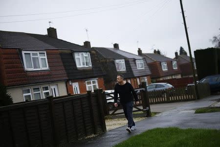 Former British soldier Rob Lawrie walks near his home in Guiseley, Britain January 6, 2016. REUTERS/Darren Staples