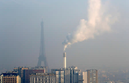 A view from the AirParif Generali balloon shows the Eiffel Tower through a small-particle haze as air pollution levels rise in Paris, France, January 23, 2017. REUTERS/Philippe Wojazer