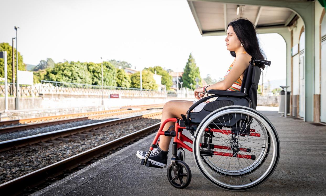 <span>Rail transport is said to be particularly problematic for disabled passengers, who face barriers and fear inadequate assistance.</span><span>Photograph: Manu Vega/Getty Images</span>