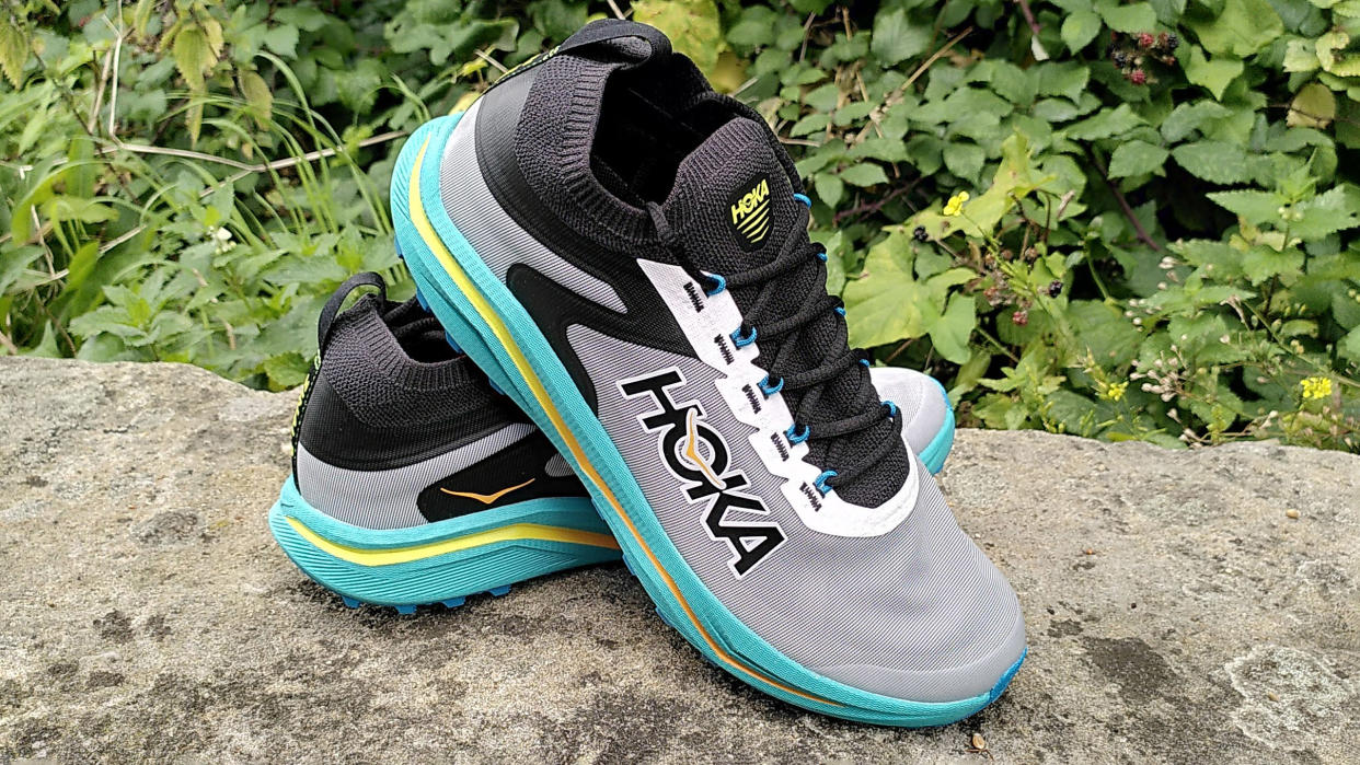  Hoka Zinal 2 trail running shoes on stone wall 