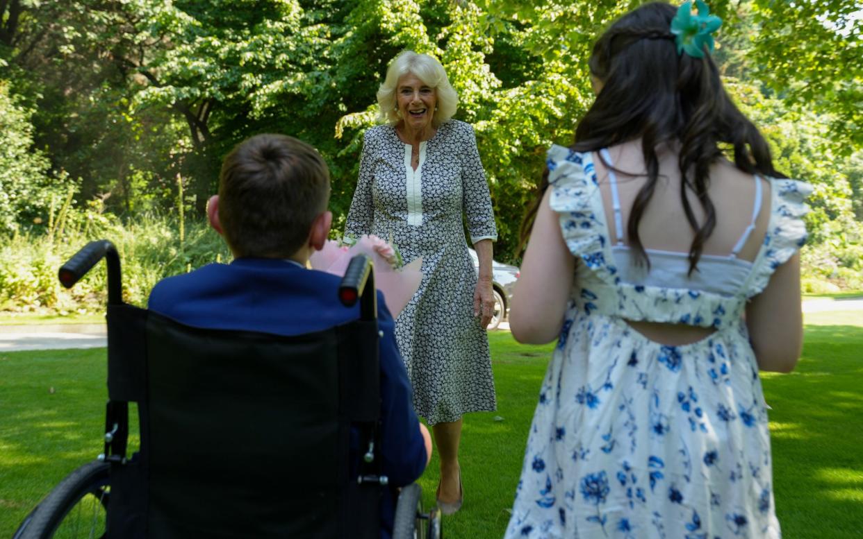 Queen greets the children